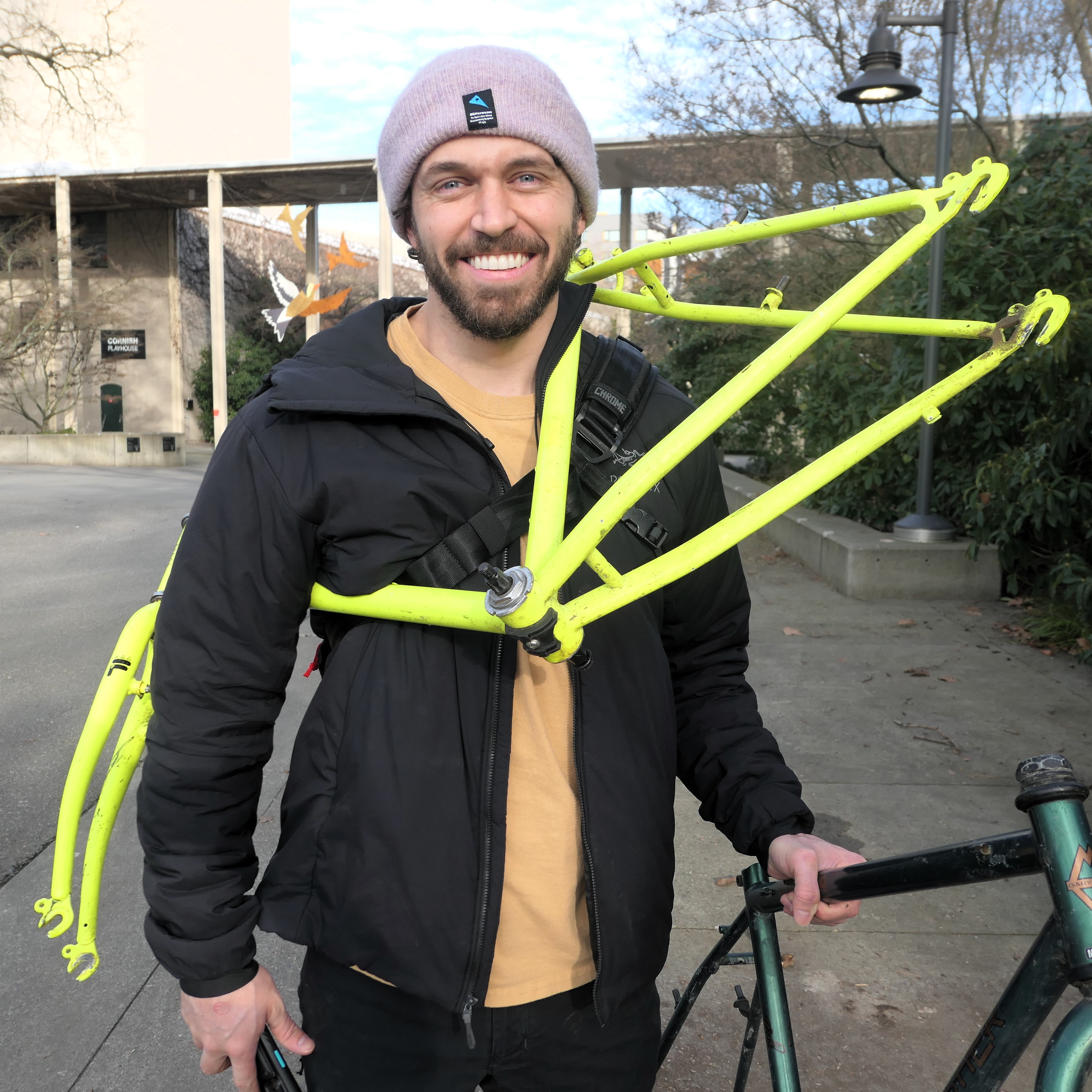 Smiling about the deals on two new bike frames.